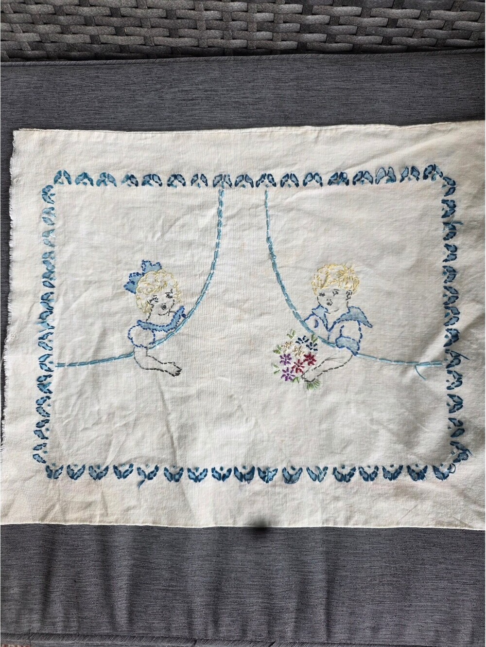 Antique Hand Embroidered linen baby pillow cases .